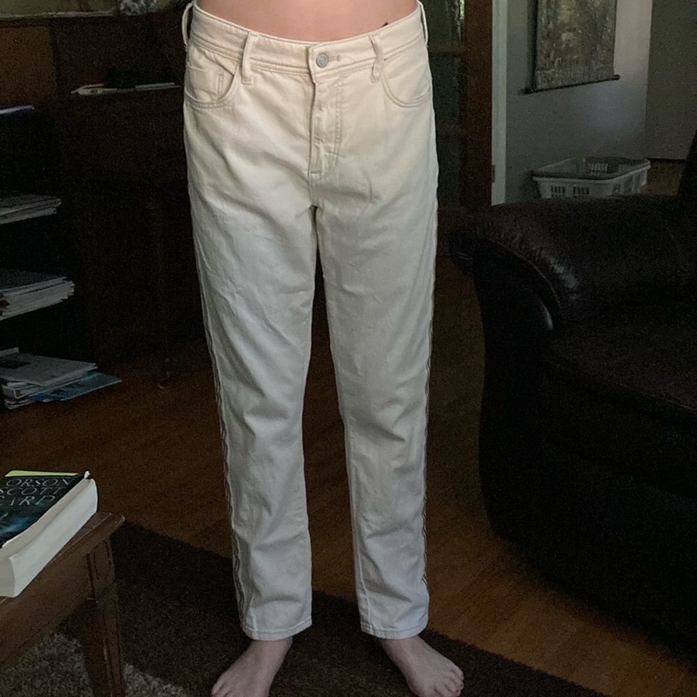 Pilcro off white slim boyfriend jeans with rainbow stripe on the side.